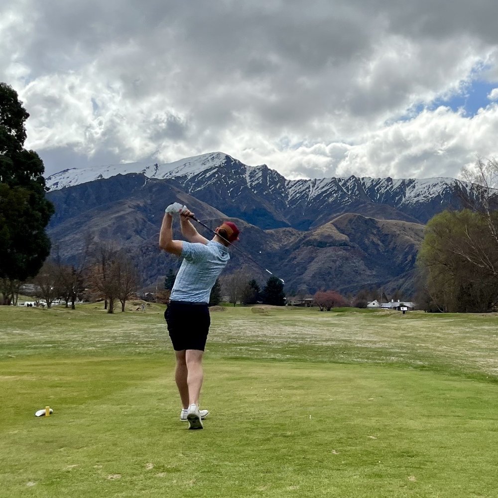 Tim White playing golf in Queenstown, New Zealand