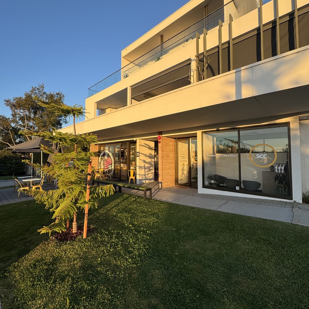 The Scarborough Chiro Clinic shopfront on Edgehill Street at golden hour, next to Lady Latte cafe
