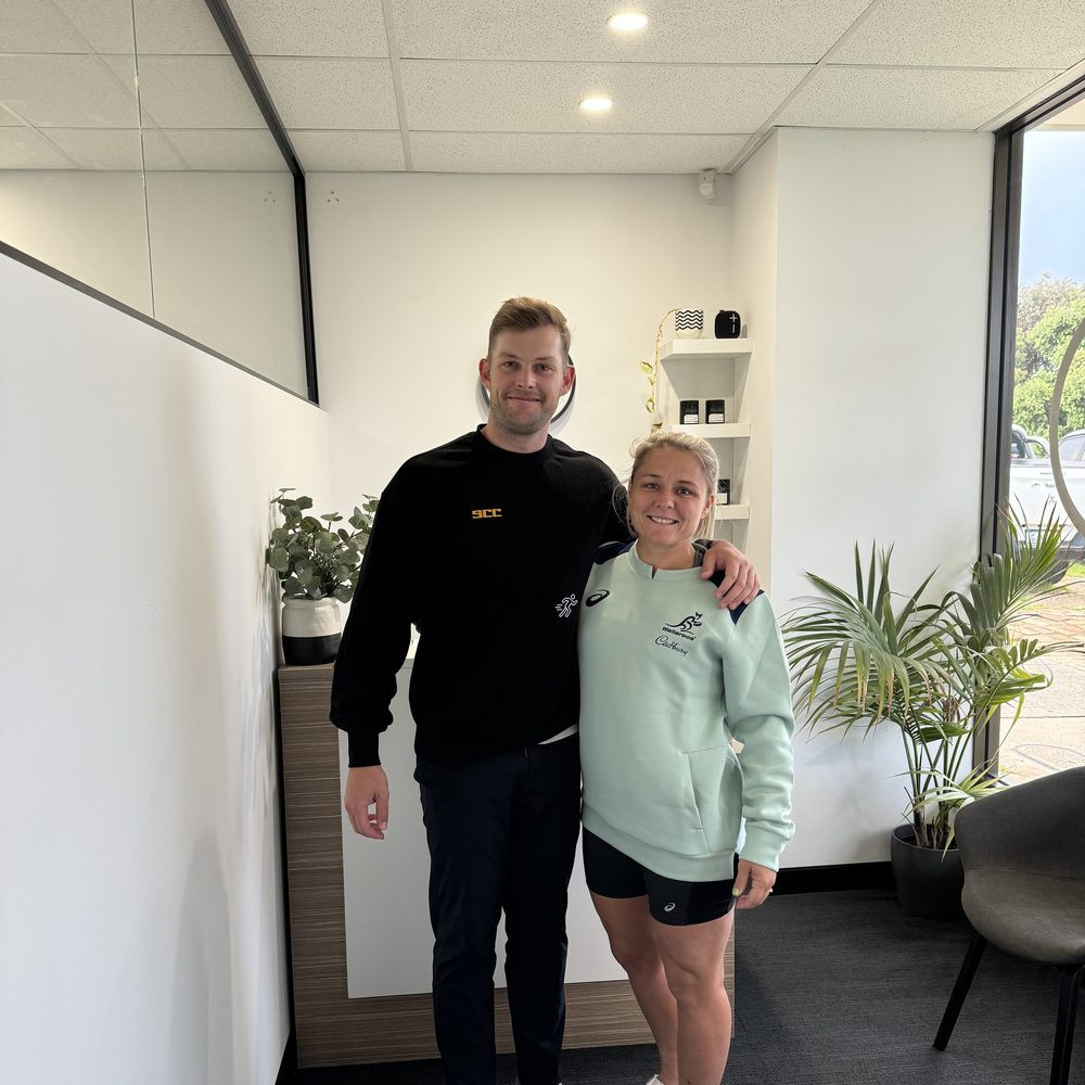 Tim White with Wallaroos player Lucy at Scarborough Chiro Clinic